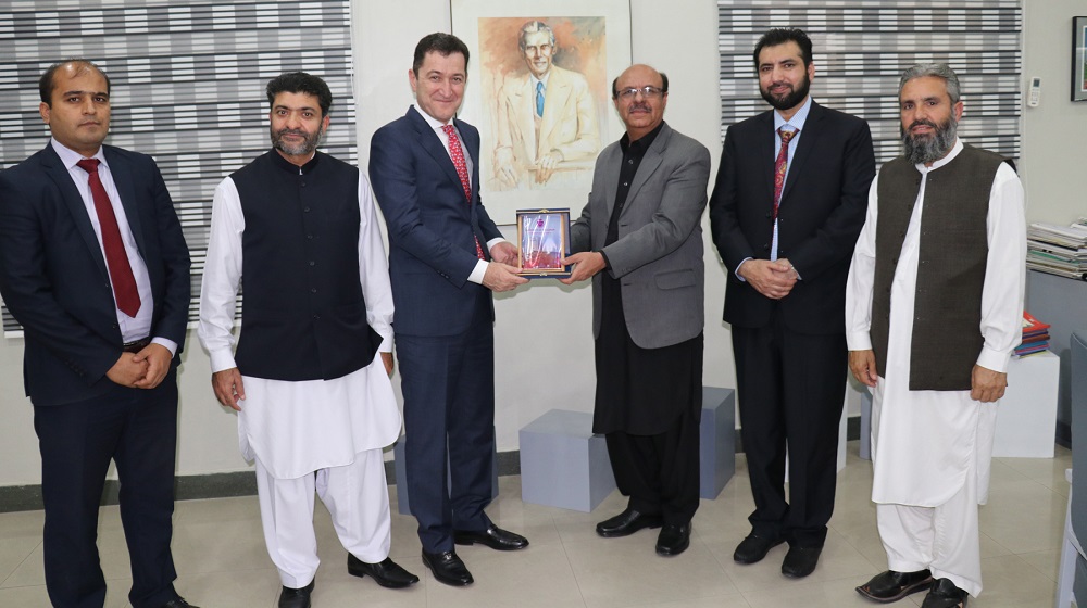 The Vice Chancellor University of Peshawar Prof. Dr. Muhammad Asif Khan is presenting a souvenir to visiting ambassador of Tajikistan in Pakistan His excellency Sher Ali Jananov for a talk at Area Study Centre on friday, 26th October, 2018.